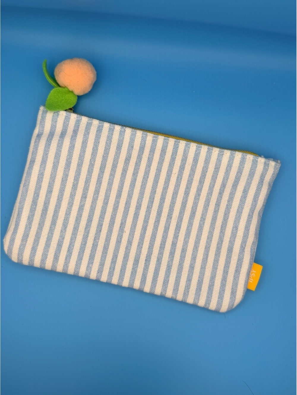 Ipsy Blue and White Striped Cosmetic Pouch with Peach Charm